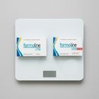 En våg med två förpackningar av FormolineL112