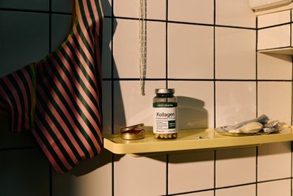 Kollagenprodukt p&aring; en badrumshylla